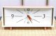 リズム時計・昭和４０年代・ベル付き手巻き【一日巻】側面、後ろがピンク色