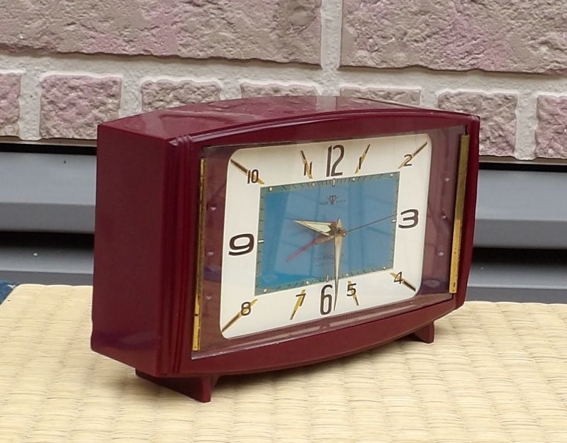 画像: 東京時計・昭和30年代ベル付き手巻き・小豆色（ワインレッド）のケースがお洒落