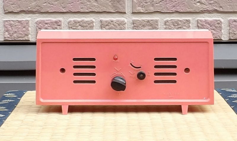 画像: リズム時計・昭和４０年代・ベル付き手巻き【一日巻】側面、後ろがピンク色