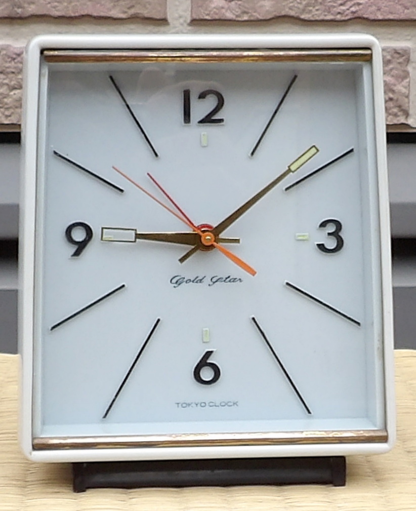 画像1: 東京時計・ゴールドスター・昭和４０年代ベル付き手巻き・極薄いブルーと後ろ側黒のケース