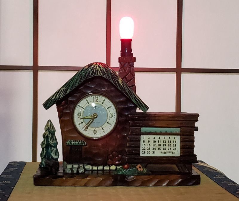 画像: 東京時計・山小屋風・昭和３０年代オルゴール付置き時計【三色すみれ】カレンダー、豆電球付き