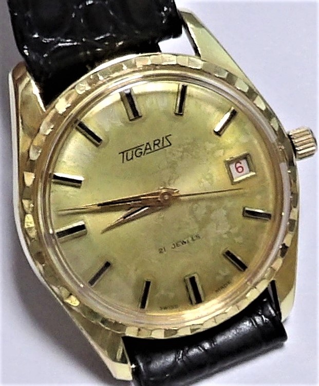 ツガリス（TUGARIS)・スイス製紳士手巻き・カレンダー付き・１９６０ 